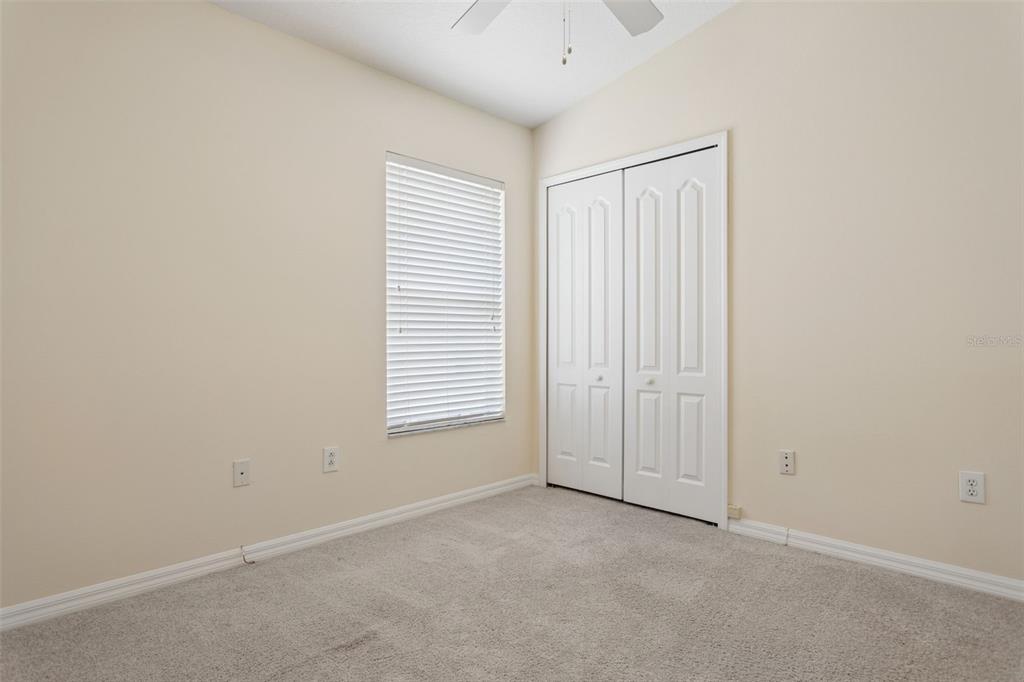 25932 Terrawood Loop Land O Lakes, FL 34639 - Photo 14 of 28 an empty room with windows