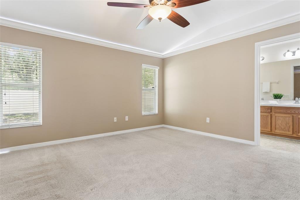 25932 Terrawood Loop Land O Lakes, FL 34639 - Photo 17 of 28 a view of an empty room with a window