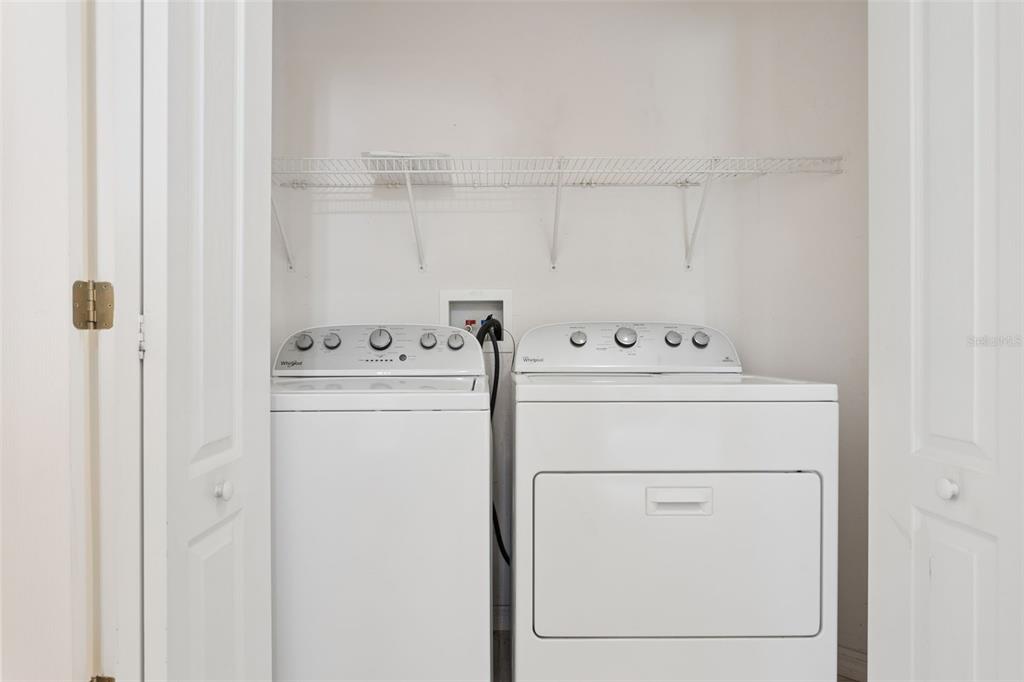 25932 Terrawood Loop Land O Lakes, FL 34639 - Photo 23 of 28 a utility room with dryer and washer