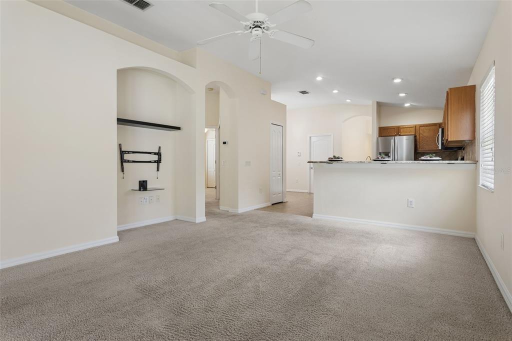 25932 Terrawood Loop Land O Lakes, FL 34639 - Photo 10 of 28 a view of a kitchen with a refrigerator and a sink
