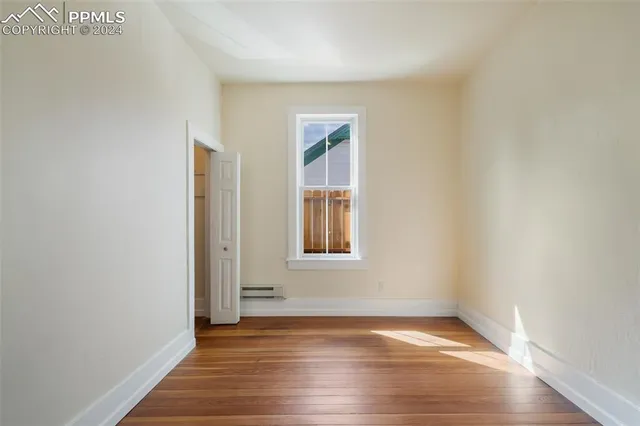 a bathroom with a sink toilet and mirror