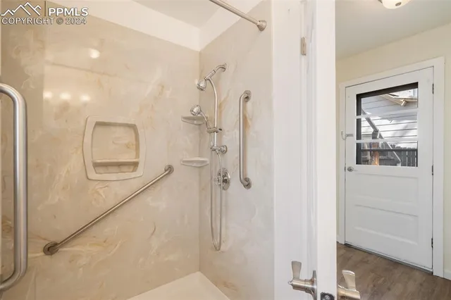a view of storage and utility room with washer and dryer