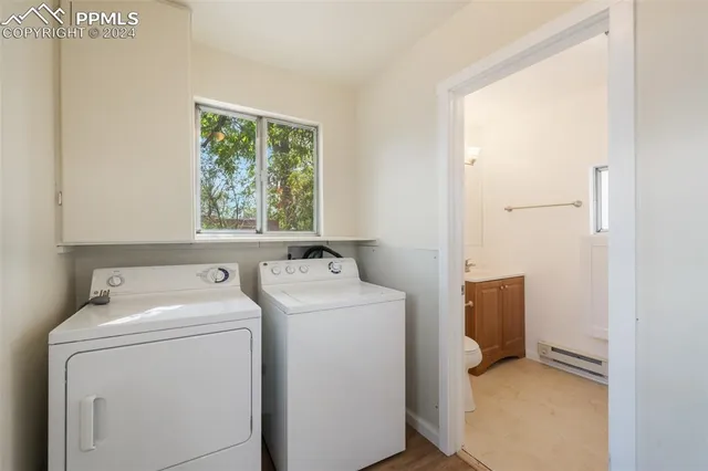 a utility room with dryer and washer
