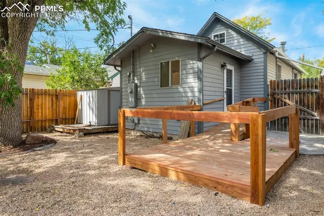 a view of a wooden bench on the deck