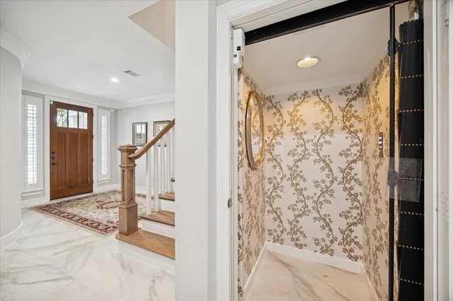 a view of a hallway with windows