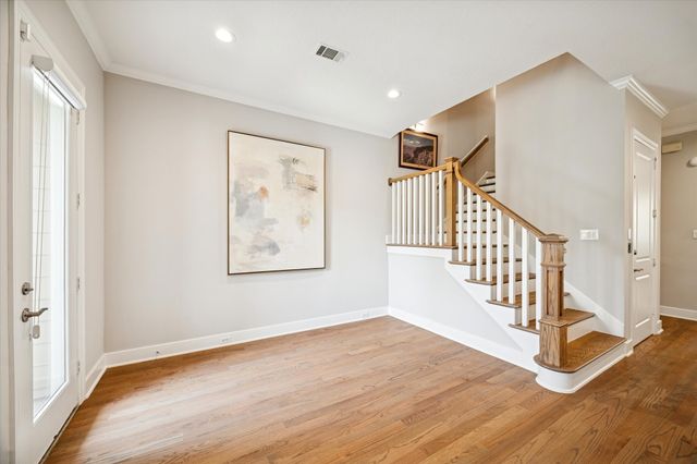 a open kitchen with stainless steel appliances granite countertop a sink stove and refrigerator