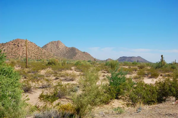 a view of mountain view with mountains in the background