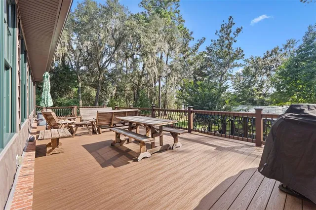 a view of a house with a tree