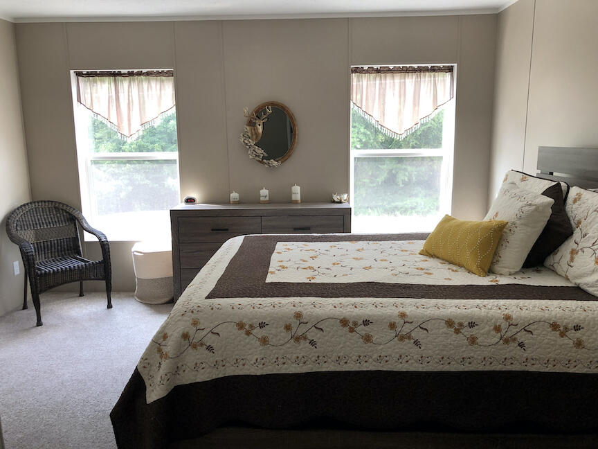 1485 Pine Ridge Road Huddleston, VA 24104 - Photo 13 of 52 a bedroom with a bed and a window