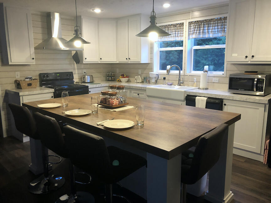 1485 Pine Ridge Road Huddleston, VA 24104 - Photo 10 of 52 a kitchen with a sink cabinets and window