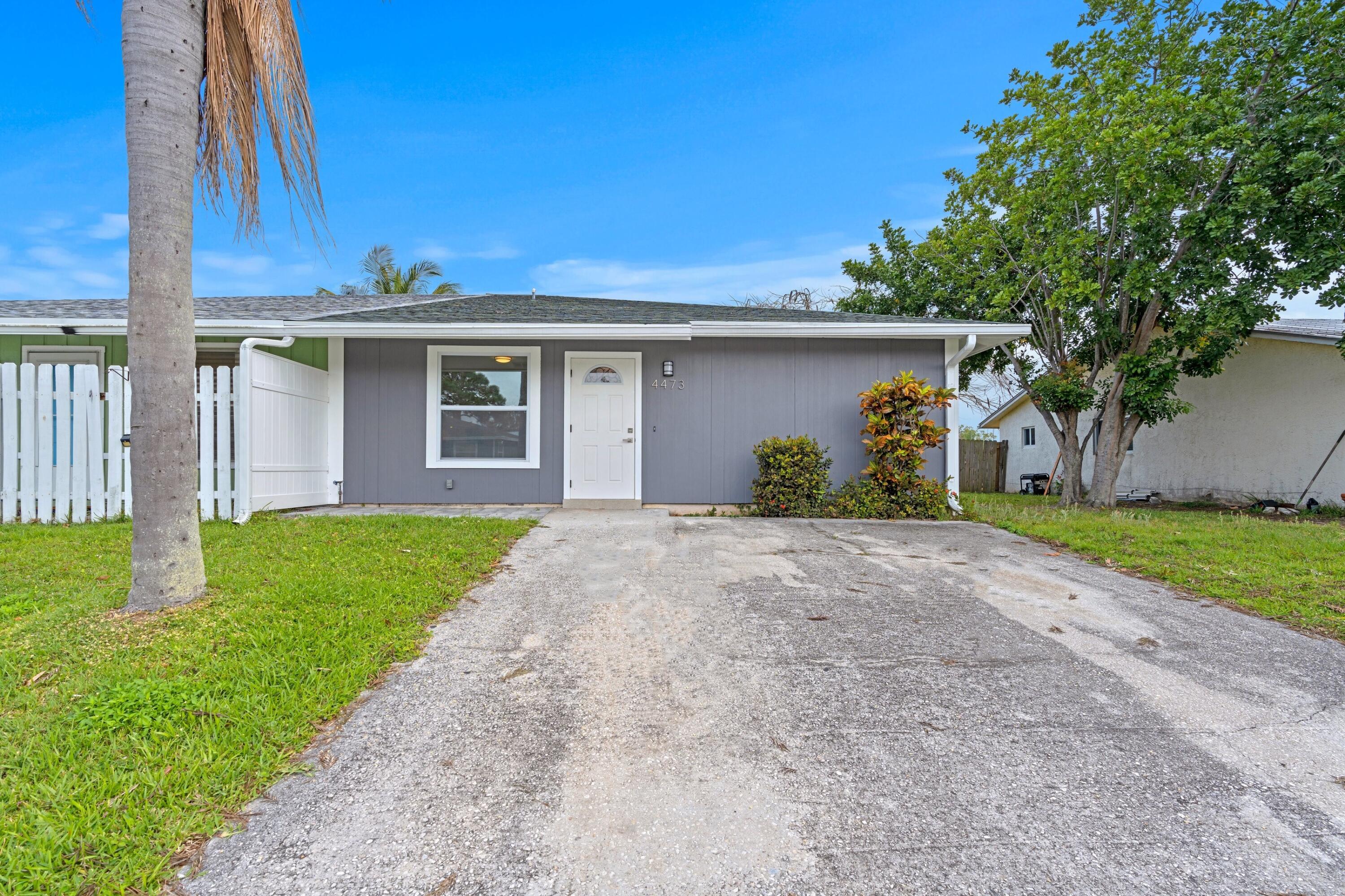 4473 Southeast Village Road Stuart, FL 34997 - Photo 19 of 20 Front Exterior