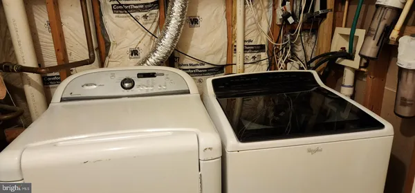 a close up view of washer and dryer