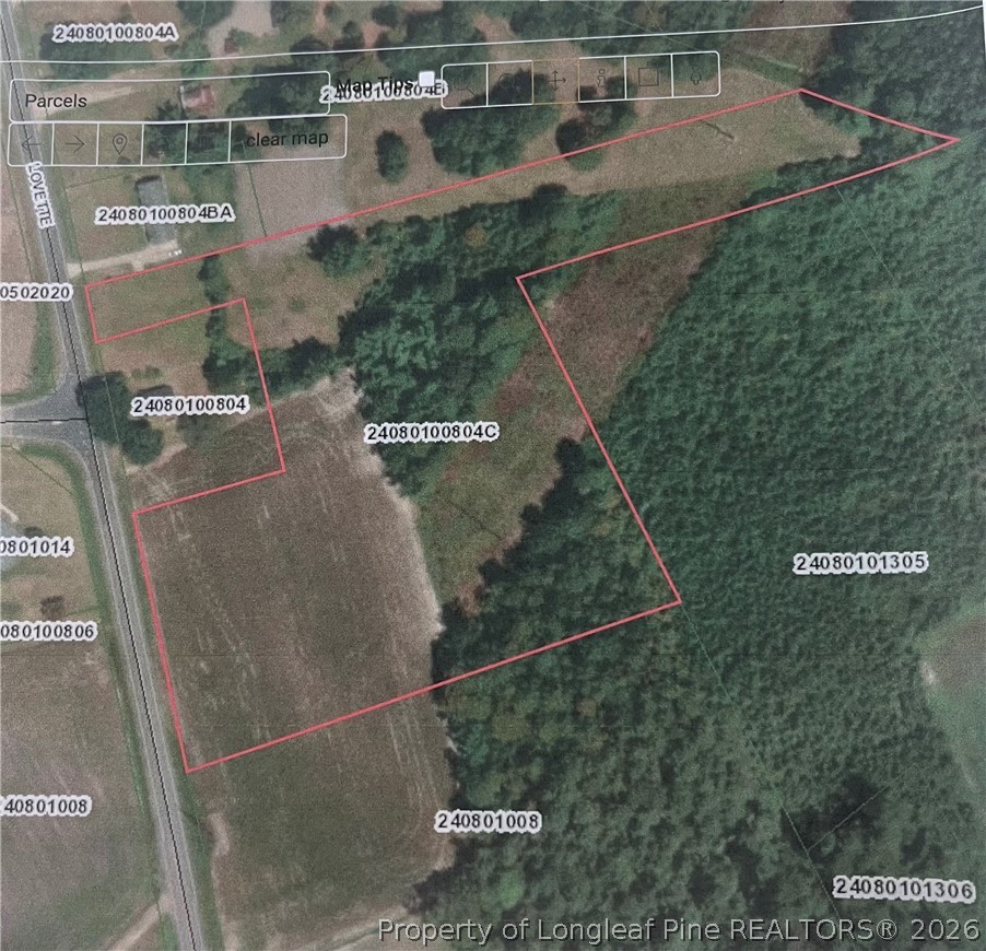 5029 Lovette Road Lumberton, NC 28358 - Photo 6 of 6 an aerial view of residential houses with outdoor space