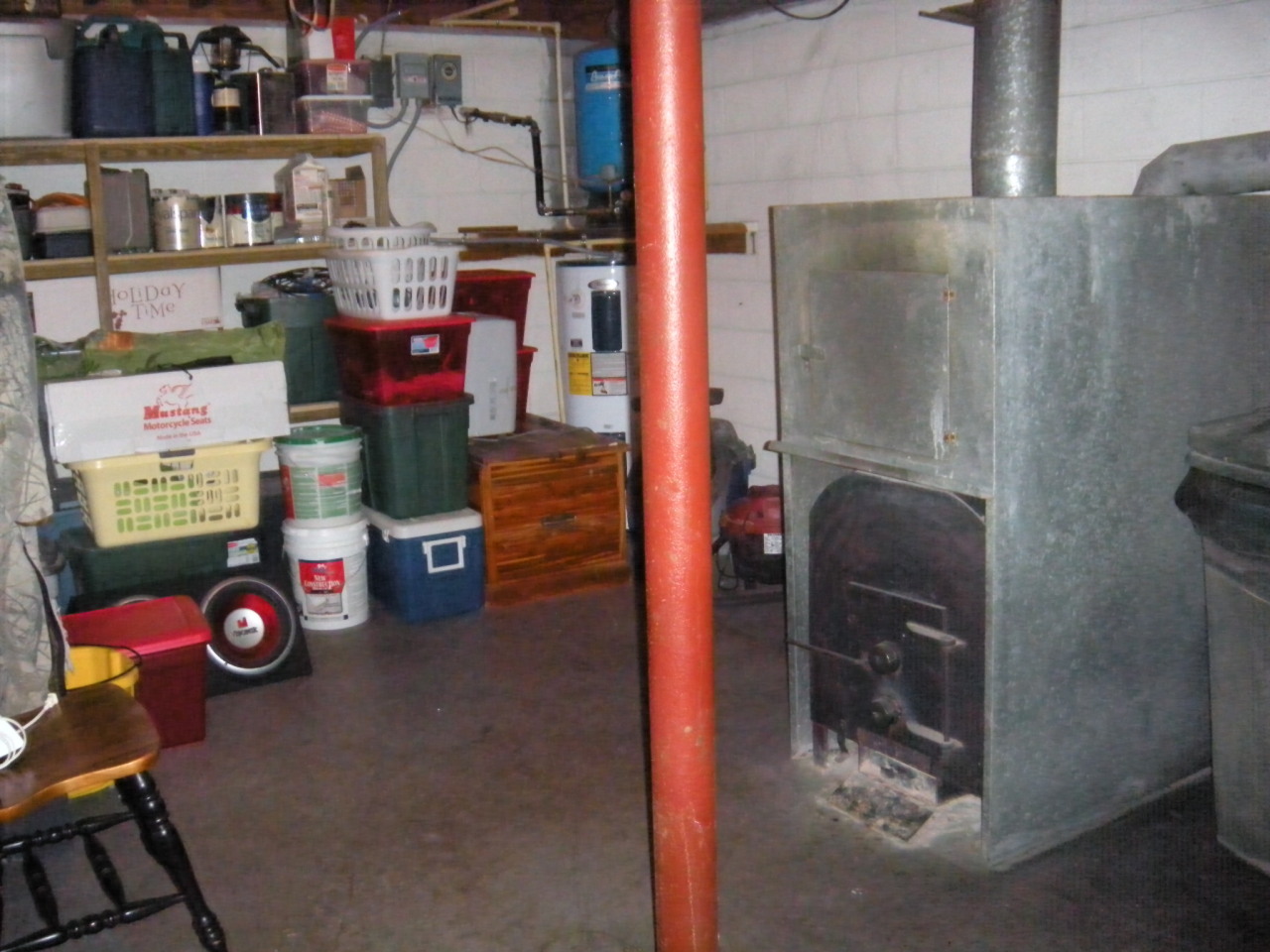 12947 Snow Creek Road Penhook, VA 24137 - Photo 15 of 35 large untility room with wood stove