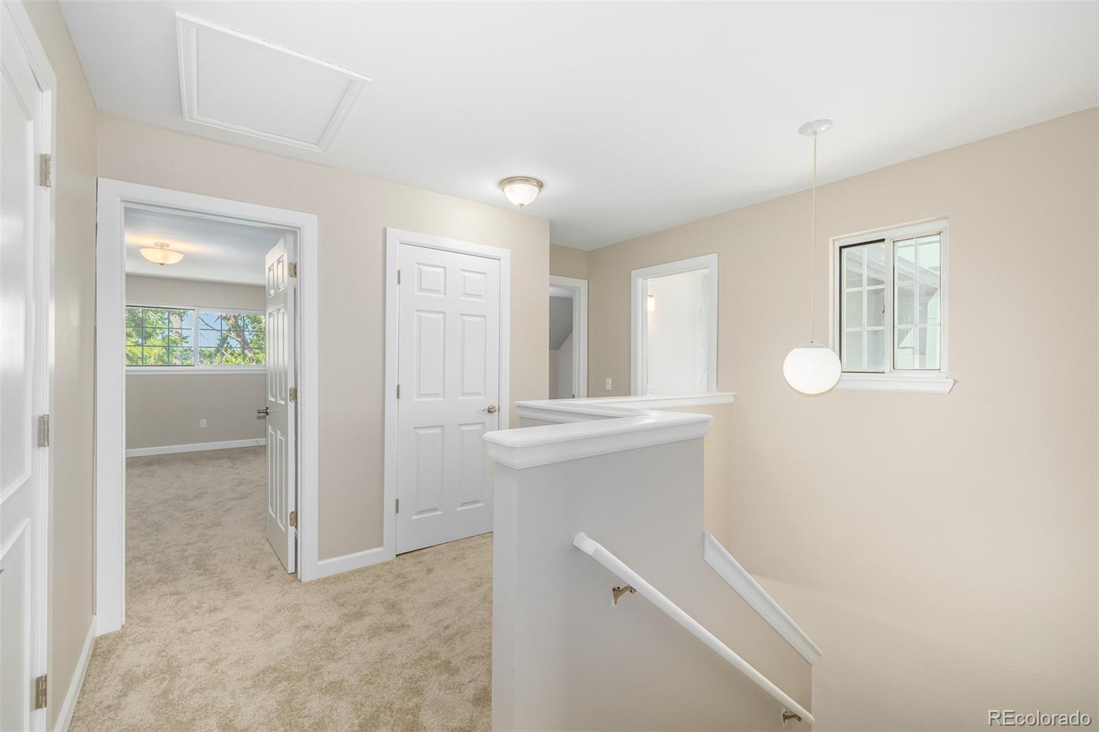 10401 West Red Mountain Road Littleton, CO 80127 - Photo 18 of 40 a view of an empty room with a bathroom