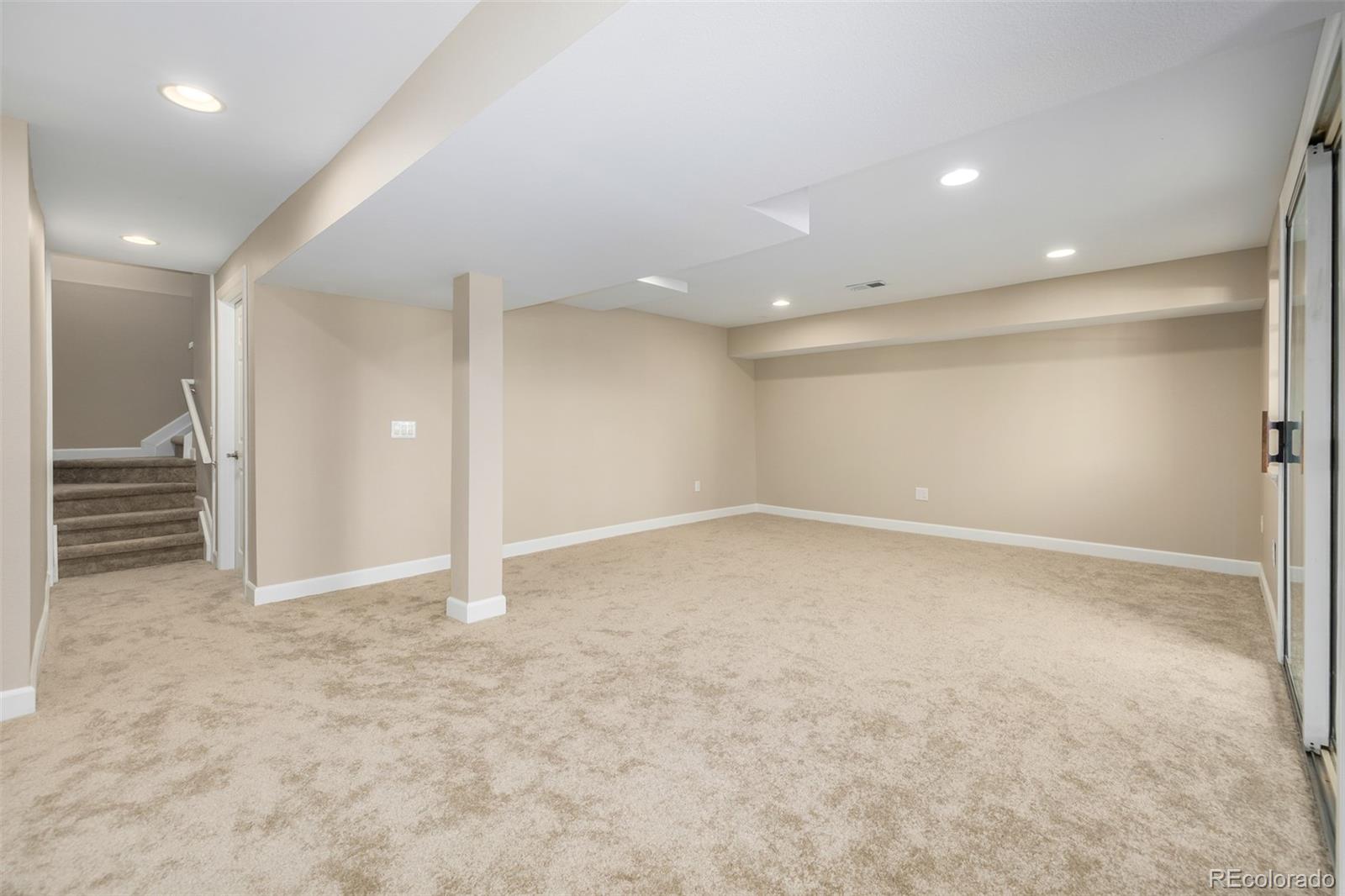 10401 West Red Mountain Road Littleton, CO 80127 - Photo 29 of 40 an empty room with a bathroom