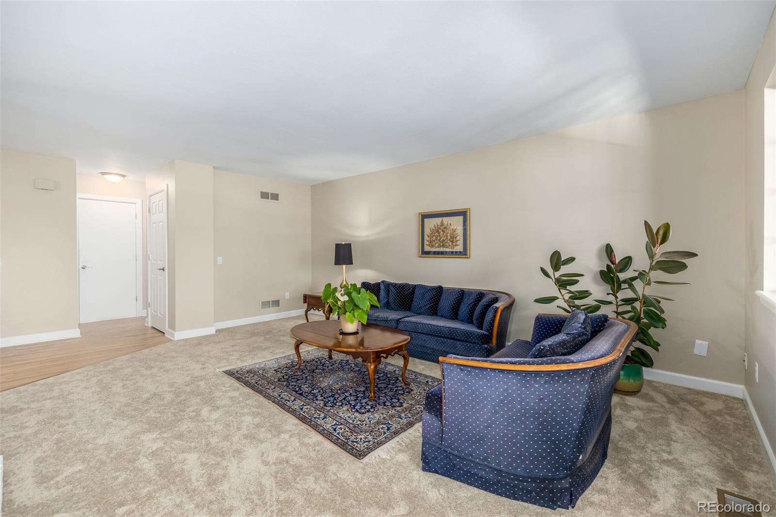 10401 West Red Mountain Road Littleton, CO 80127 - Photo 6 of 40 a living room with furniture