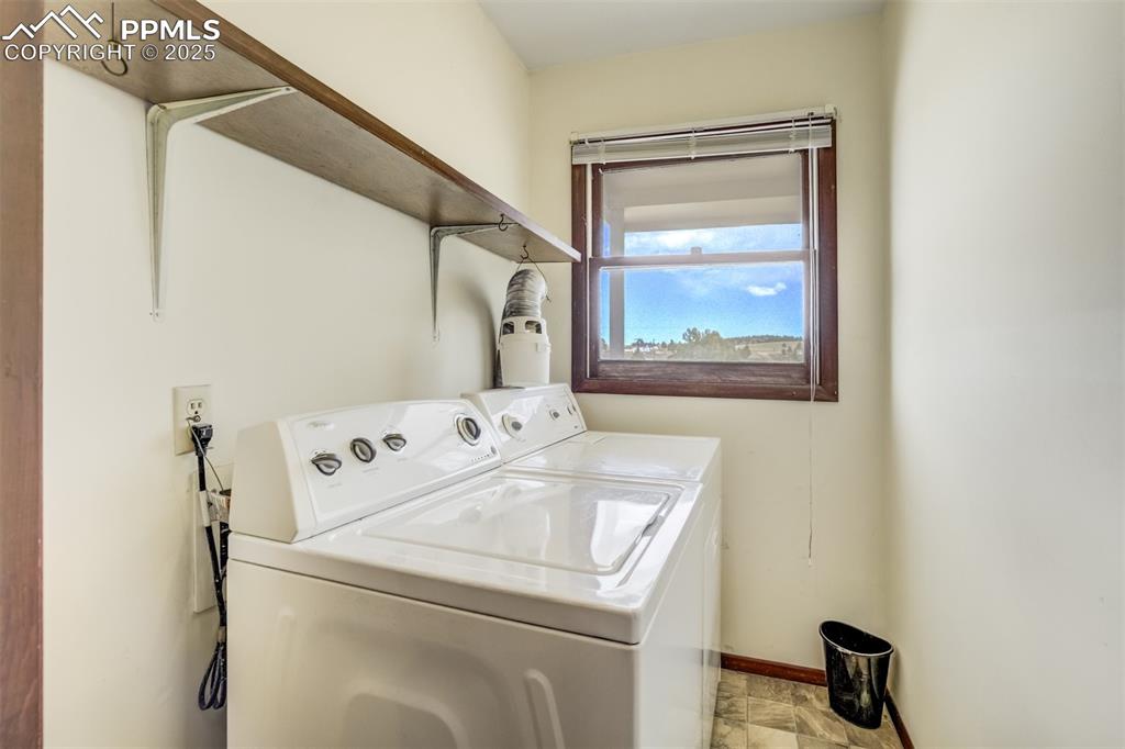 65 Yeoman Lane Divide, CO 80814 - Photo 14 of 43 a utility room with dryer and washer