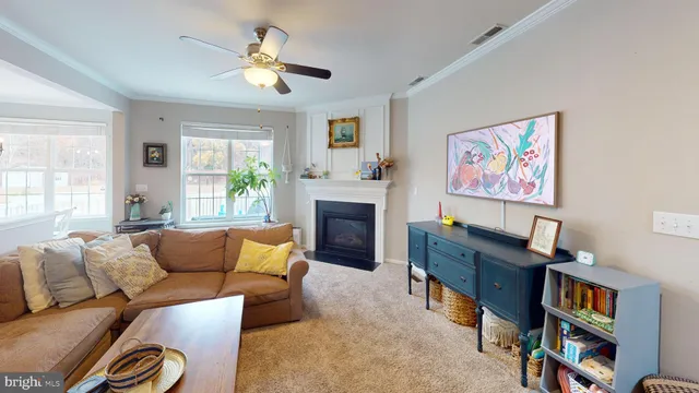 a bedroom with a bed and a chair