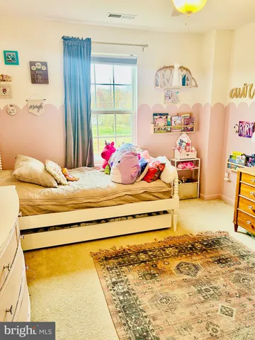 a room with gym equipment and toys