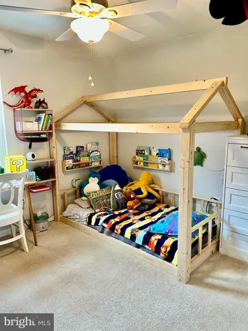 a kitchen with stainless steel appliances granite countertop a stove sink and cabinets