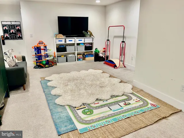 a bed room with furniture and a window