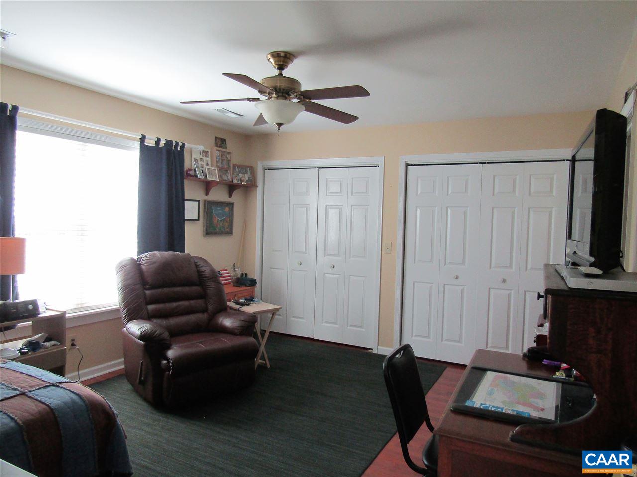 44 Amethyst Road Palmyra, VA 22963 - Photo 10 of 23 a living room with furniture and a flat screen tv