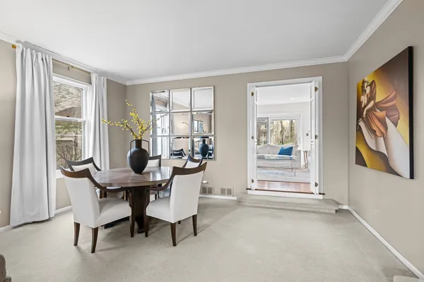 a view of a livingroom with furniture and a window