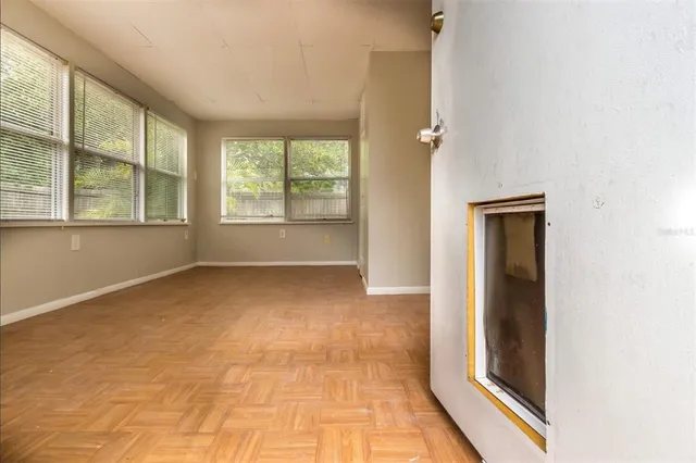 an empty room with windows