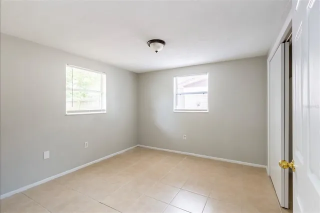 an empty room with windows