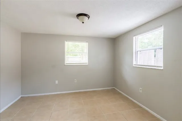 an empty room with windows