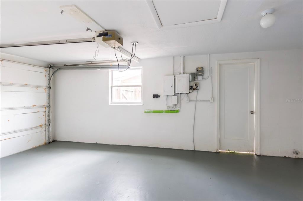 7735 Rottingham Road Port Richey, FL 34668 - Photo 22 of 24 a view of a storage & utility room with closet