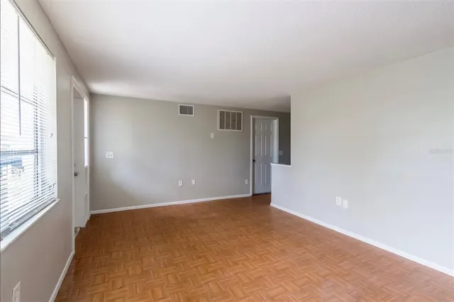 an empty room with windows