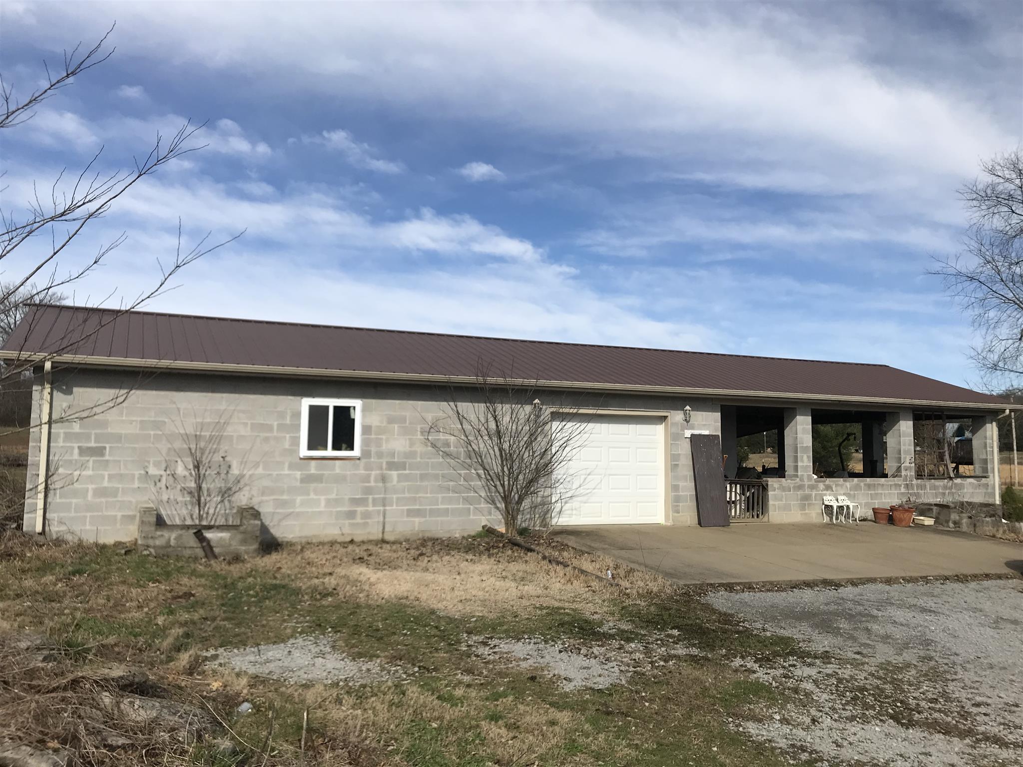5745 Simmons Bluff Road Lebanon, TN 37090 - Photo 5 of 26 Large 60x25 foot building with an outdoor entertaining area and kitchen.