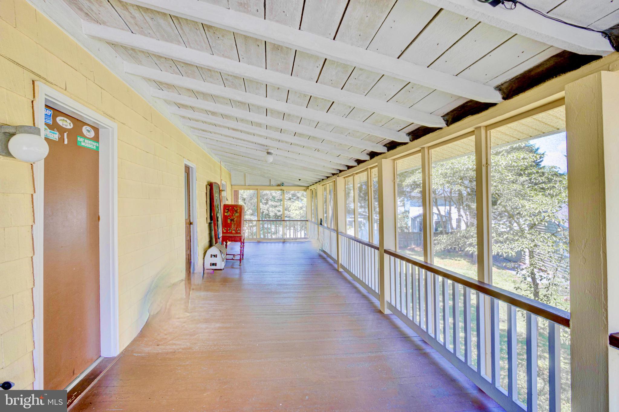 1428 Winnie Place Edgewater, MD 21037 - Photo 26 of 77 Upper level screen porch offers access to each BR