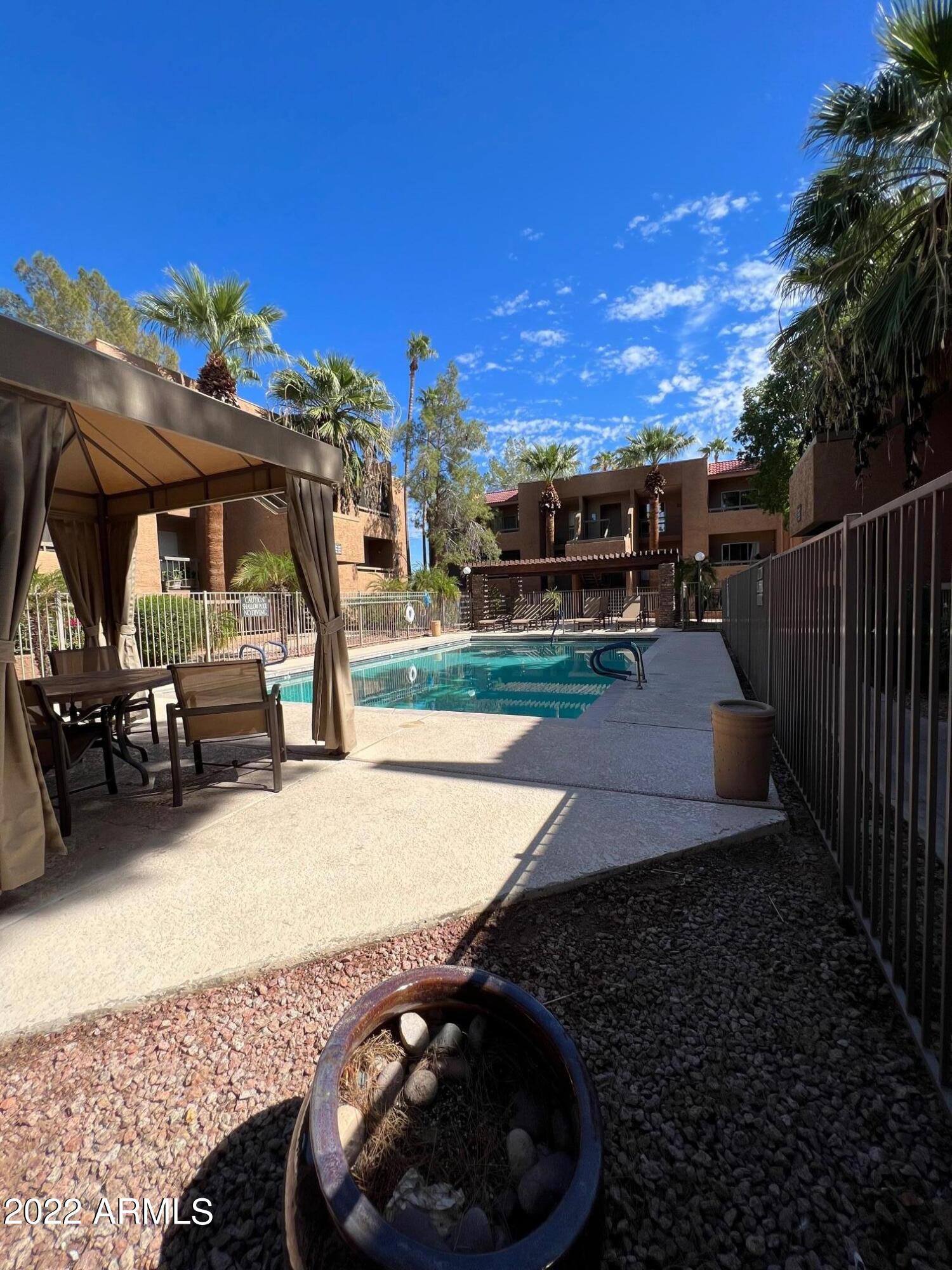 2625 East Indian School Road, Unit 101 Phoenix, AZ 85016 - Photo 13 of 15 a view of a backyard of the house