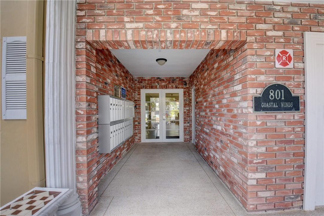 801 North Riverside Drive, Unit 3C Pompano Beach, FL 33062 - Photo 19 of 34 SECURE LOBBY ENTRANCE