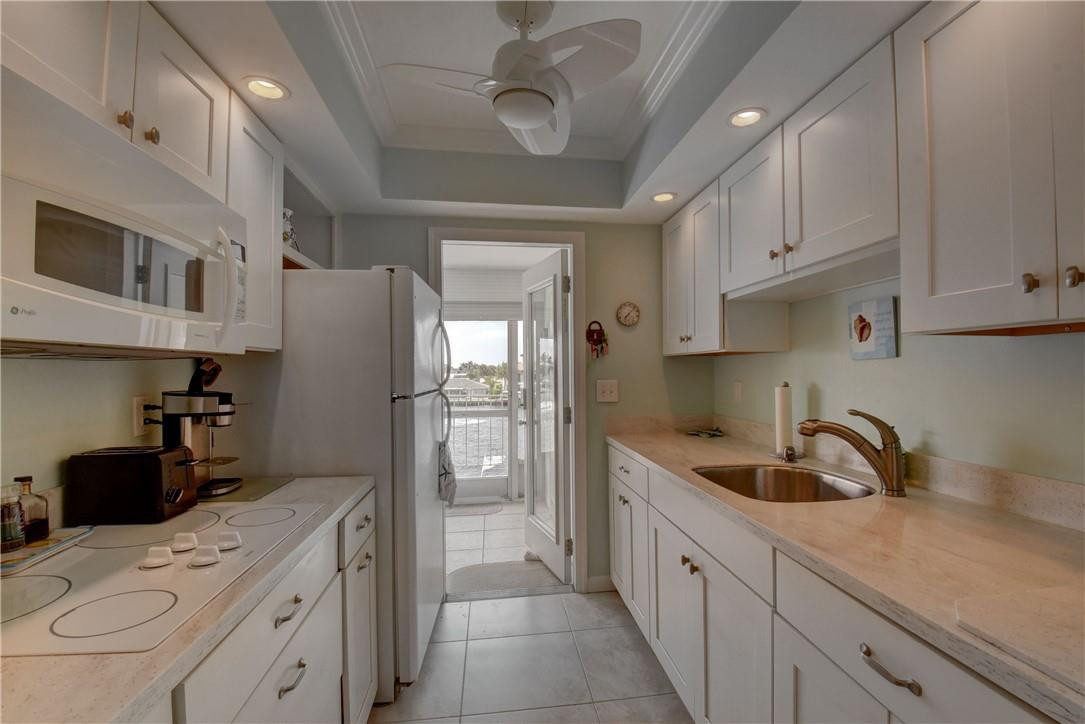 801 North Riverside Drive, Unit 3C Pompano Beach, FL 33062 - Photo 3 of 34 REMODELED KITCHEN