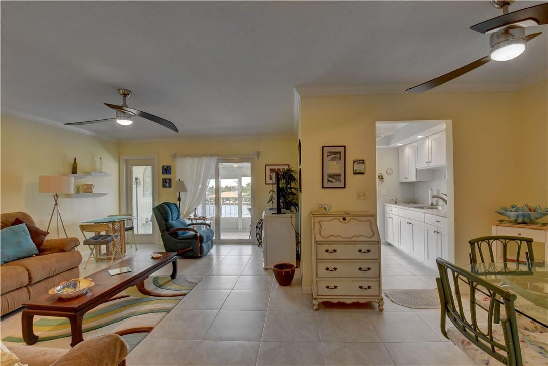801 North Riverside Drive, Unit 3C Pompano Beach, FL 33062 - Photo 32 of 34 L-SHAPE LIVING ROOM/DINING AREA