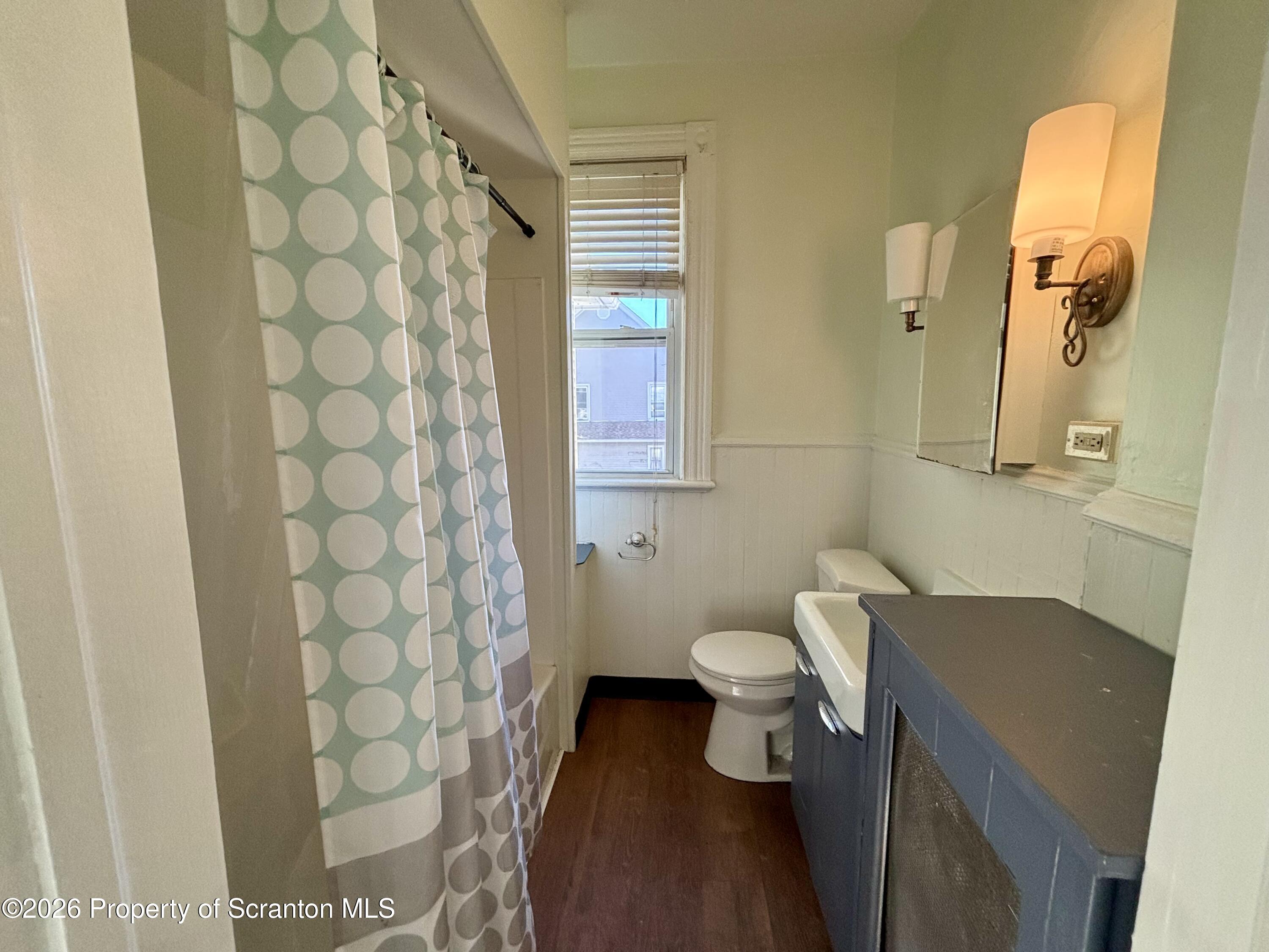 218 South Main Avenue Scranton, PA 18504 - Photo 5 of 9 a bathroom with a sink toilet and shower