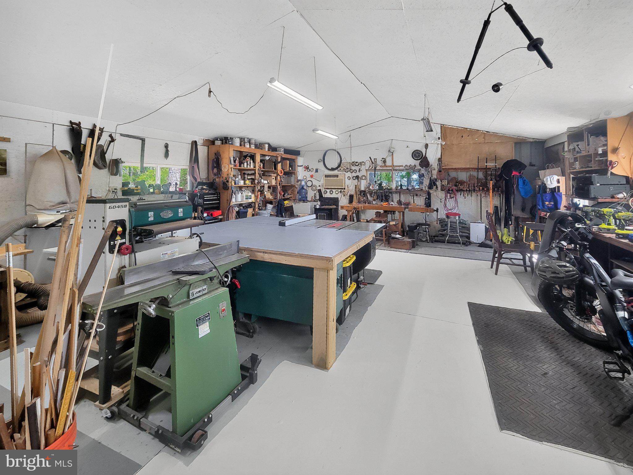 5214 David Greene Road Cambridge, MD 21613 - Photo 56 of 73 Spacious workshop for creative projects.