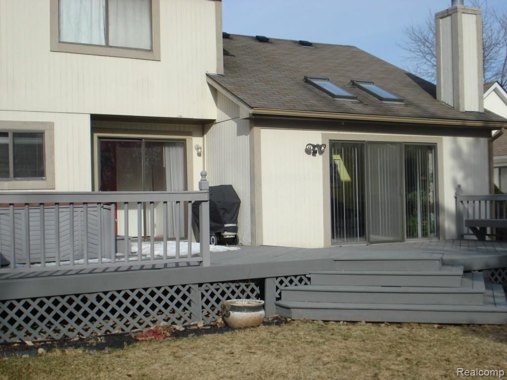 338 North Willard Road Canton, MI 48187 - Photo 8 of 19 Large Well Maintained Deck with two sliding patio doors!!!.jpg