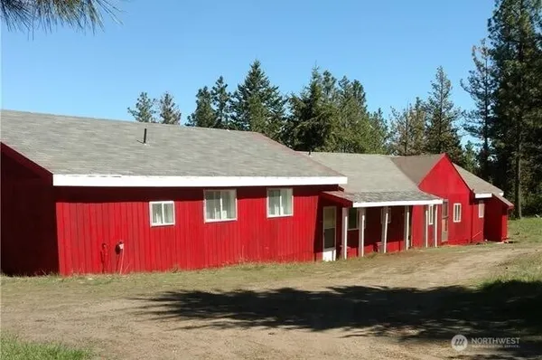 a front view of a house with yard