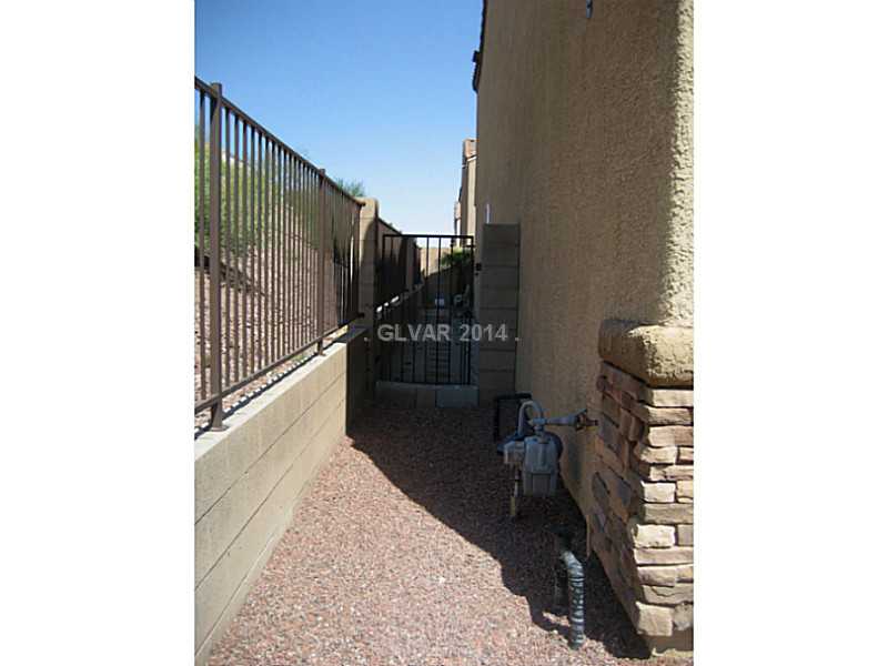 1556 Razella Court Henderson, NV 89074 - Photo 31 of 35 Property Photo. Dog run, room for storage