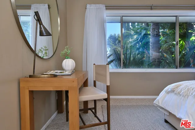 a view of a swimming pool with an outdoor space