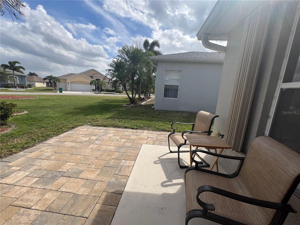 24472 Manchester Trail Punta Gorda, FL 33980 - Photo 29 of 46 a view of a patio with a yard