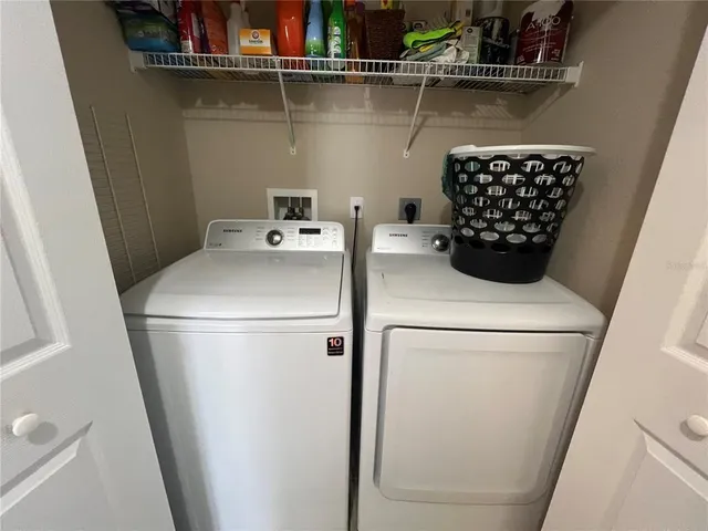 a utility room with dryer and washer