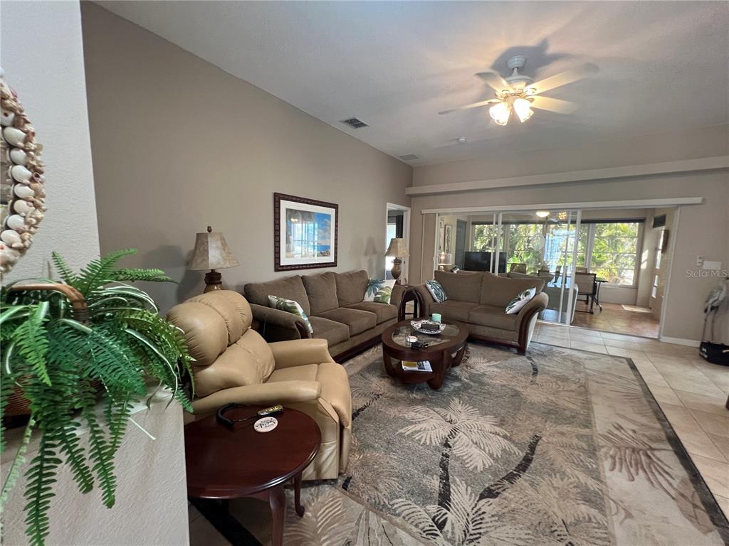 24472 Manchester Trail Punta Gorda, FL 33980 - Photo 10 of 46 a living room with furniture and a large window
