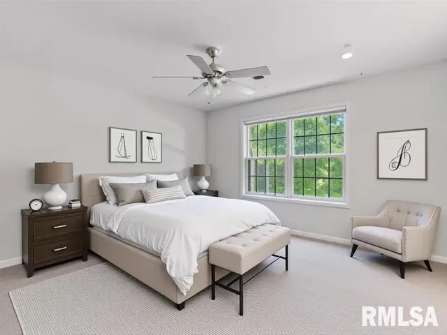a bathroom with a double vanity sink toilet and shower