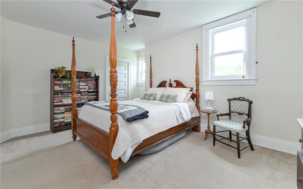 516 Pittsburgh Street Mars, PA 16046 - Photo 13 of 21 a bed room with a bed and a chair